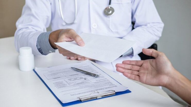 doctor prescribes treatment for parasites